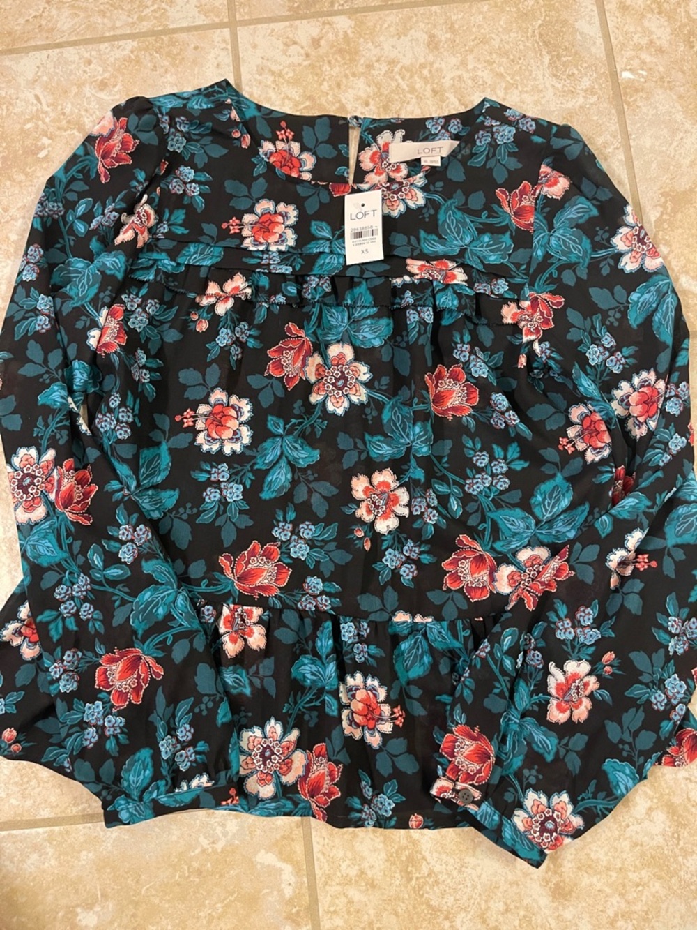 NWT LOFT Floral Print peplum blouse
Size XS